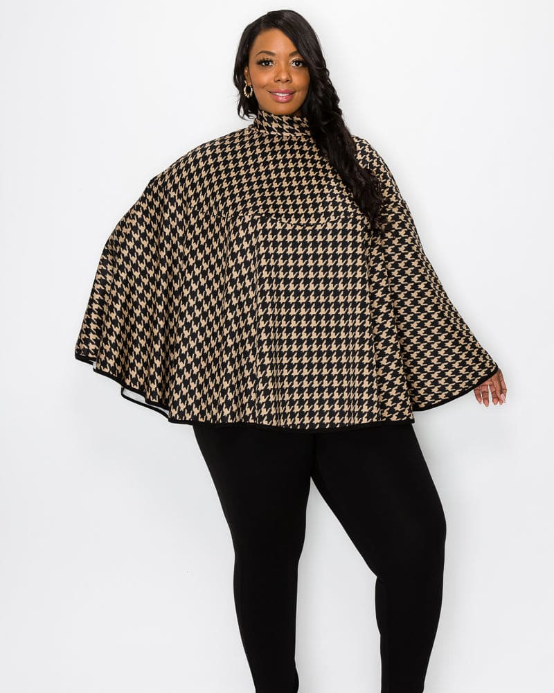 Front of a model wearing a size 1X Linda Houndstooth Poncho in Black/Taupe by L I V D. | dia_product_style_image_id:241362